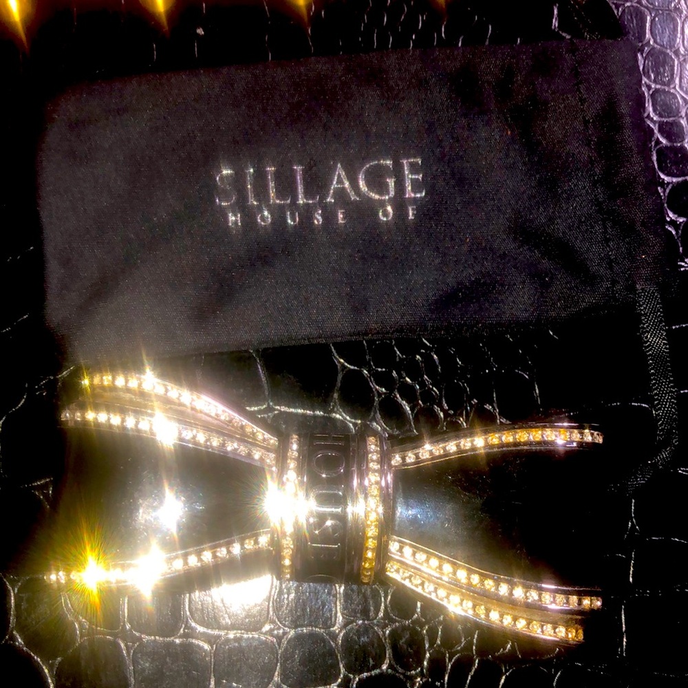 House of Sillage black bow lipstick case